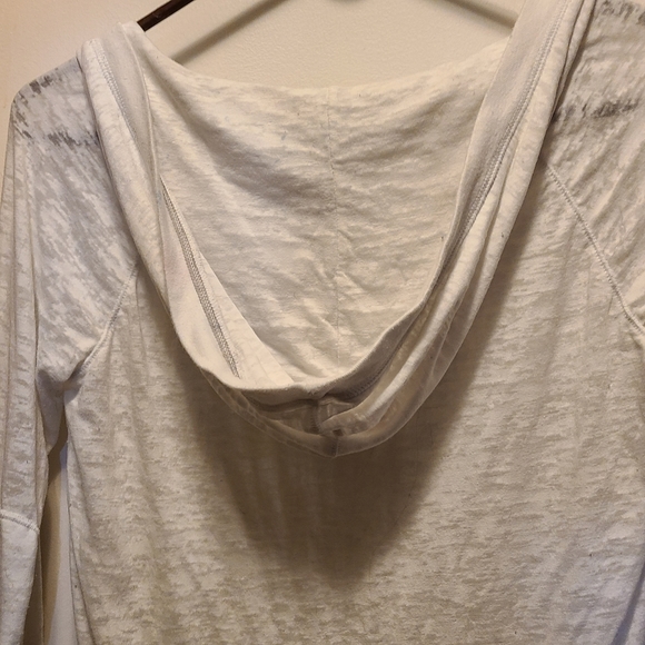 White long sleeve hooded Tee shirt with pocket for hands on front. - Picture 3 of 5